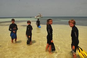 children at Chabil Mar resort, Belize off to snorkel – Best Places In The World To Retire – International Living